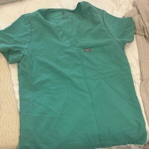Figs surgical green V-Neck Scrub Top small PEN STAIN